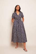 DRESSES/JUMPSUITS Asbury Midi Dress in Navy Polka Dot Cara Cara